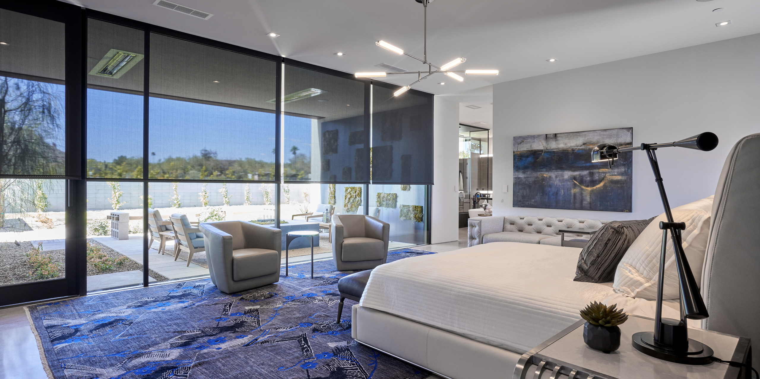 Bedroom with integrated audio and automated shades