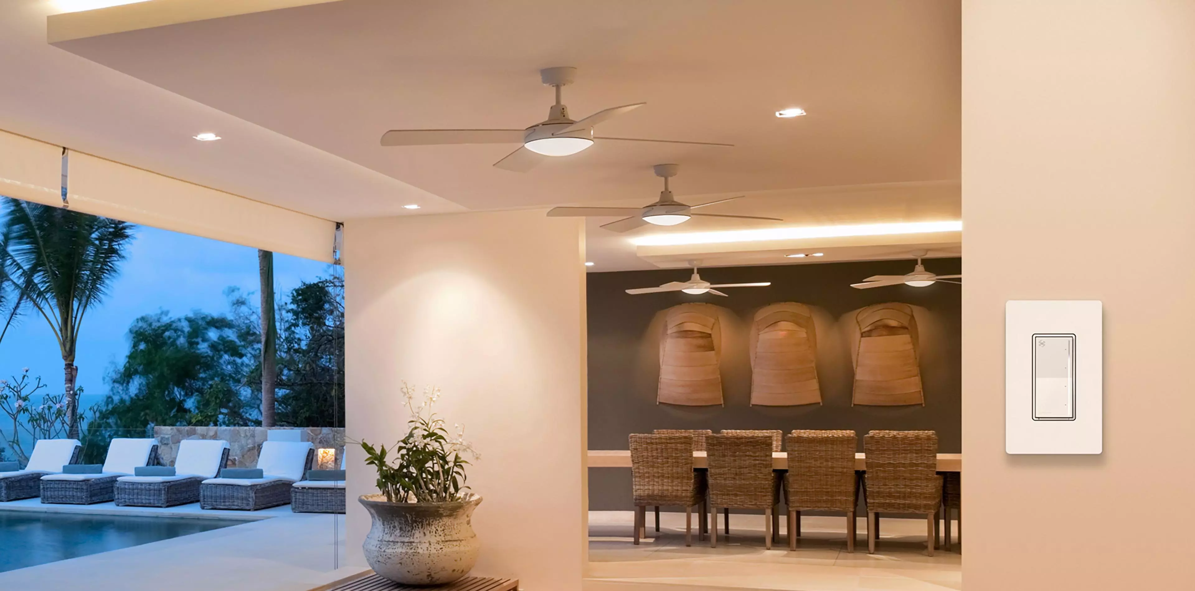 Outdoor dining area with invisible speakers creating perfect ambiance